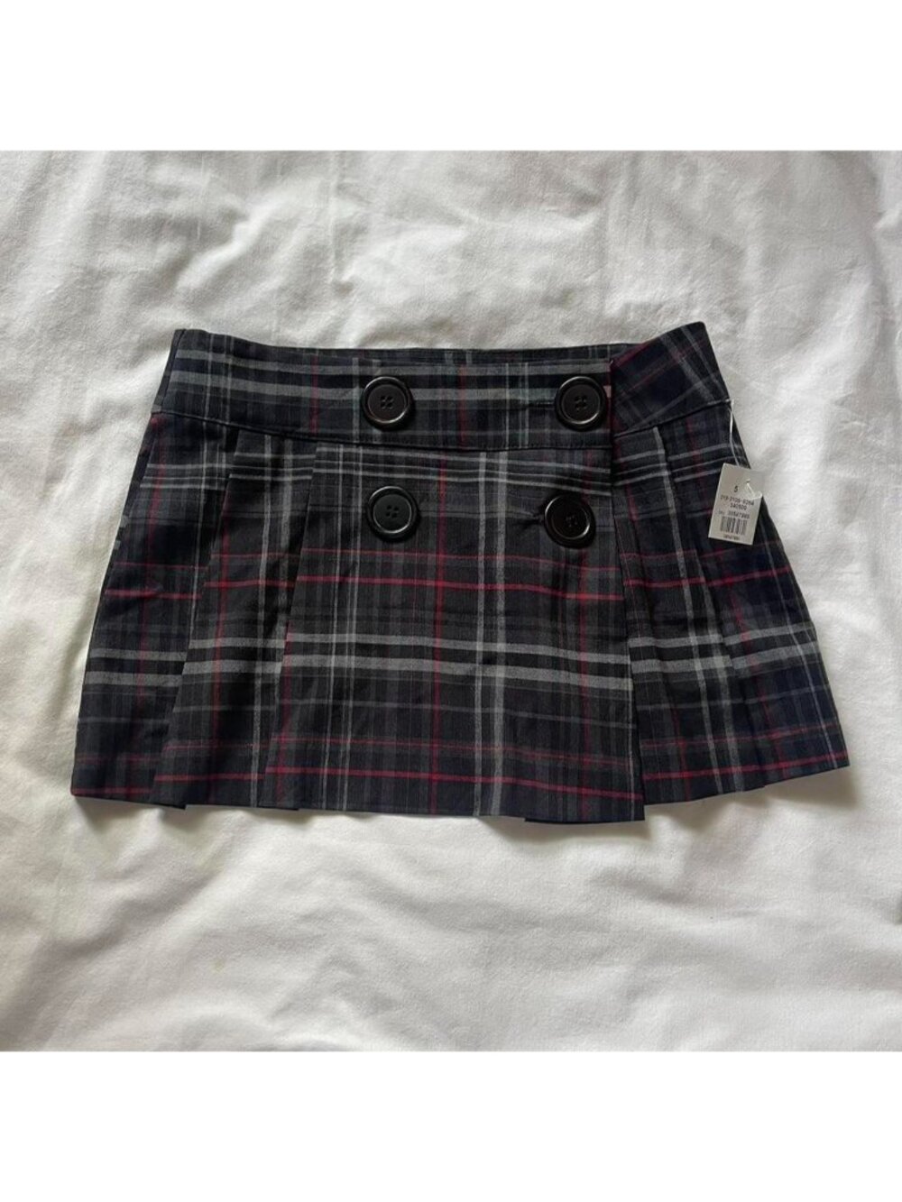Plaid mini skirt with button details size 5